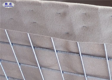 Sand und Erde gefüllte Militär-Hesco-Sperren schweißten Gabion mit den gezeichneten Geotextilien